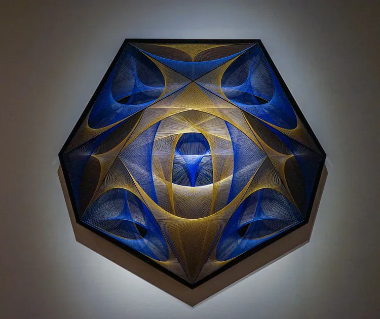             Composition: Heptagon, 2018, 188.6x201.5x8cm, polyester threads, steel          